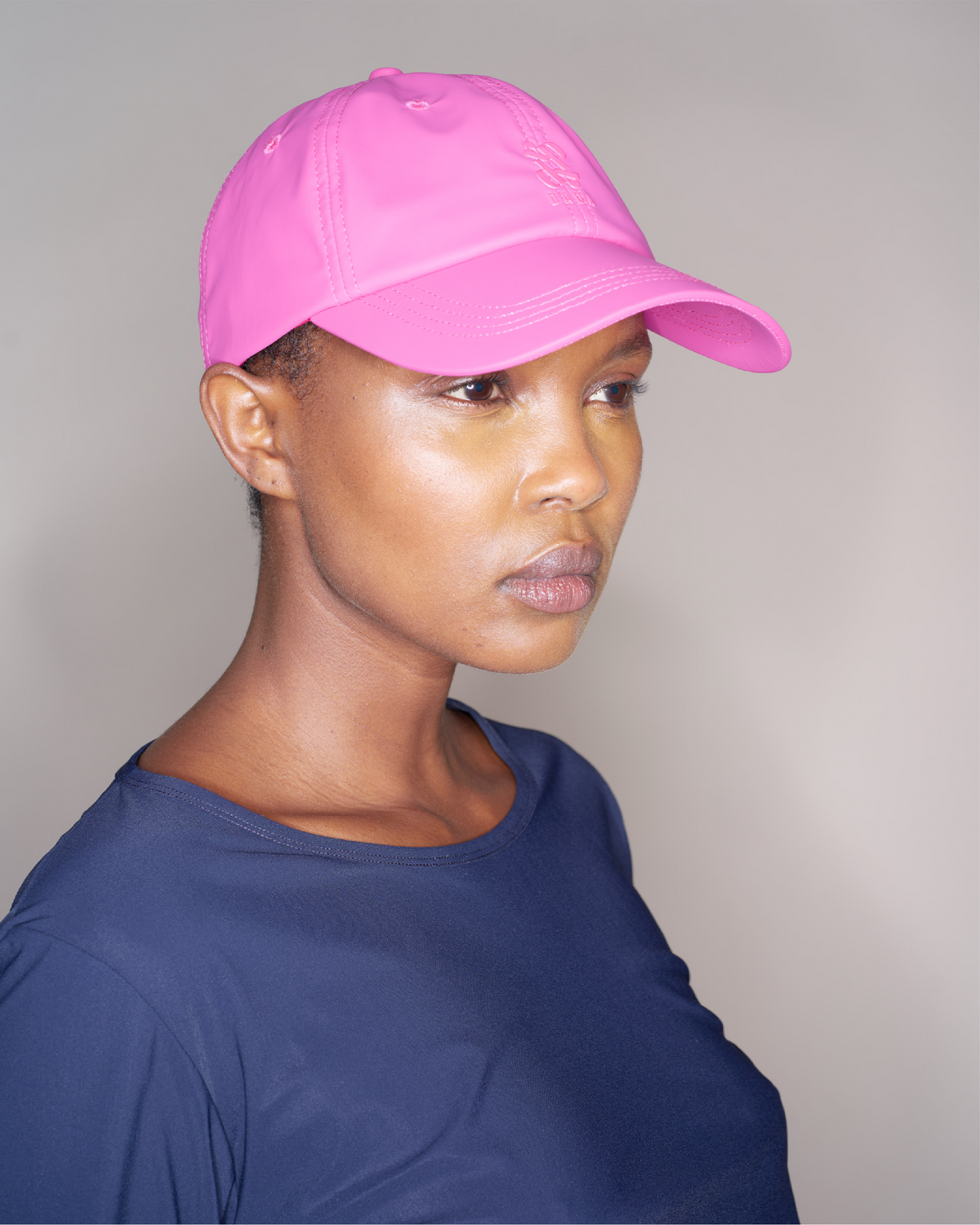 Scarlett - Casquette imperméable Fuchsia